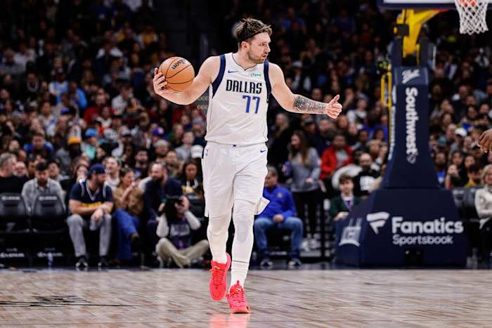 Dallas Mavericks guard Luka Doncic dribbles against the Denver Nuggets